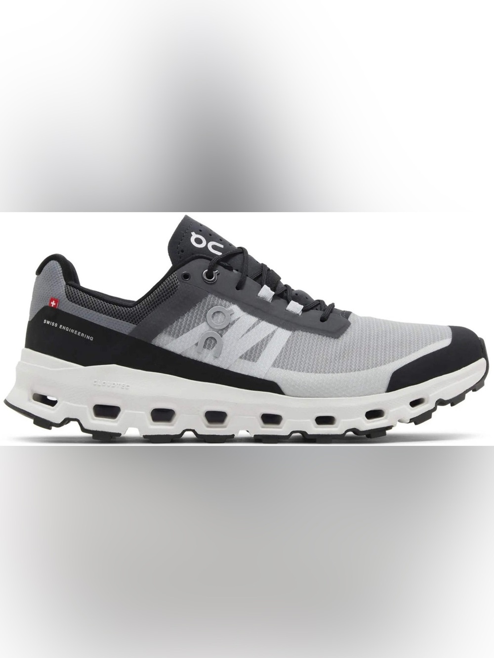 On Running Cloud Woman’s Black and Gray Cloudrunner Lightweight Sneaker